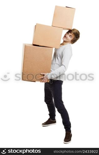 Portrait of a handsome young man holding card boxes, isolated on white