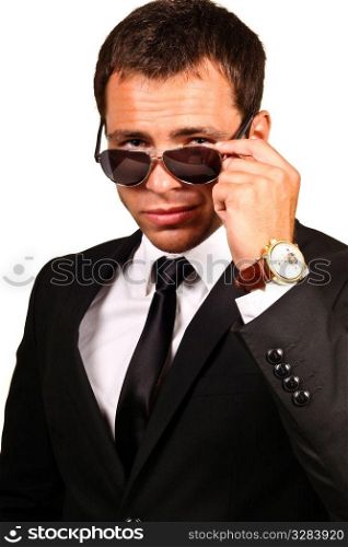 Portrait of a handsome young man in elegant suit and sunglasses. . Portrait of a handsome young man in elegant suit and sunglasses.