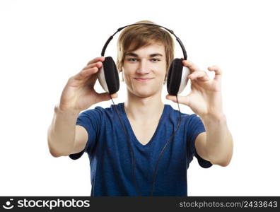 Portrait of a handsome young man showing headphones, isolated on white background