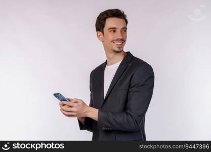Portrait of a happy businessman using smartphone over white background. Using mobile phone, typing sms message.