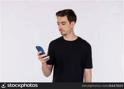 Portrait of a happy businessman using smartphone over white background. Using mobile phone, typing sms message.
