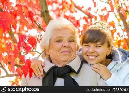 portrait of a happy family in autumn park