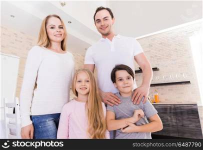 Portrait of a happy family. Portrait of a happy family smiling at home