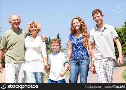 portrait of a happy family standing outdoor