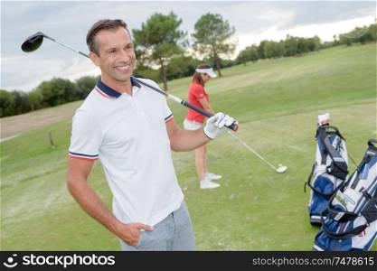portrait of a happy golfer