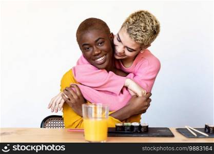 Portrait of a happy interracial homosexual couple hugging