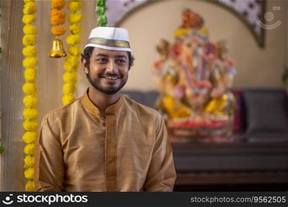 Portrait of a happy Maharashtrian man in traditional outfit on Ganesh Chaturthi festival