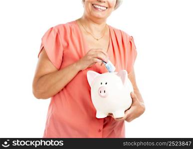 Portrait of a happy old woman putting money on a piggy bank, isolated on a white background