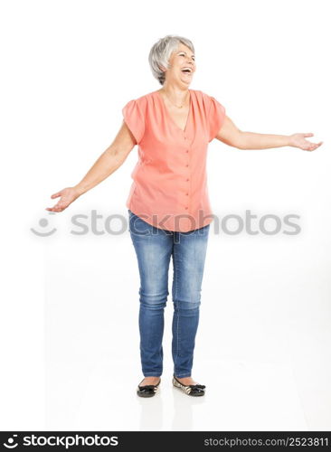 Portrait of a happy old woman with both arms open, with copyspace for the designer