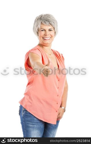Portrait of a happy old woman with thumb up, isolated on a white background