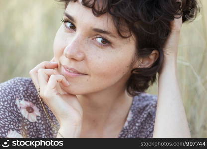 portrait of a happy smiling girl looking at the camera