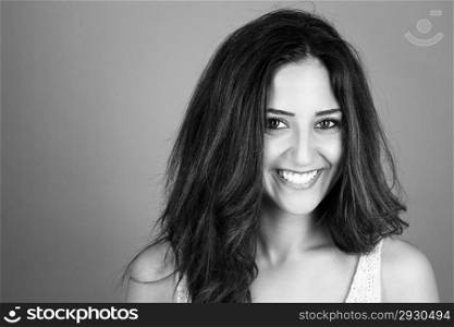 portrait of a happy woman. black and white portrait of a happy brunette woman