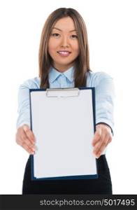 Portrait of a happy young business woman standing with clipboard against white background