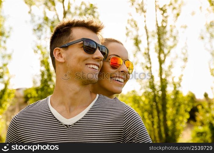 Portrait of a happy young couple embraced