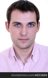 Portrait of a happy young man standing against white background