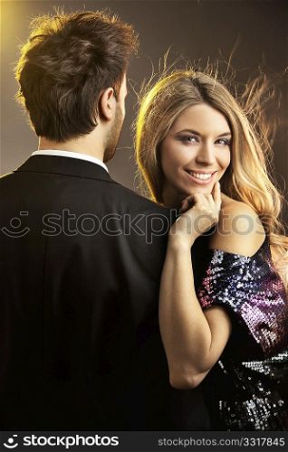 Portrait of a happy young smiling woman with her man