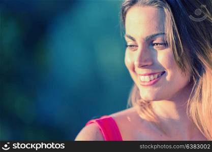 Portrait of a happy young woman, outdoor