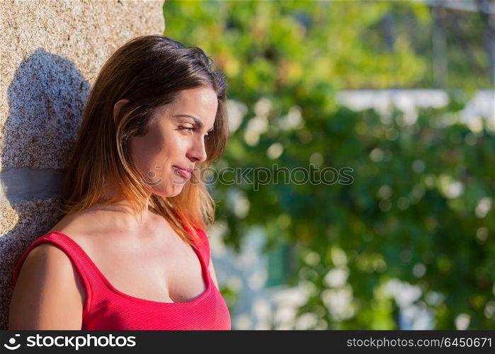 Portrait of a happy young woman, outdoor