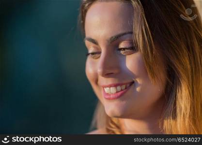 Portrait of a happy young woman, outdoor. beautiful woman
