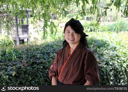 Portrait of a Japanese woman with traditional clothing.
