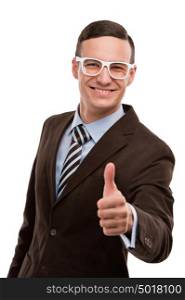 Portrait of a joyful young businessman gesturing thumb up sign over isolated white background