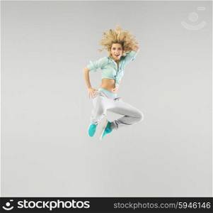 Portrait of a jumping blond woman