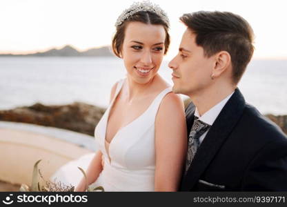 Portrait of a just married couple at sunset