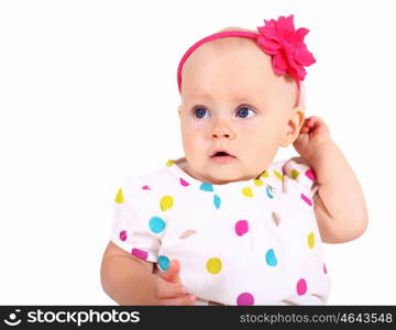 Portrait of a little blond girl in studio