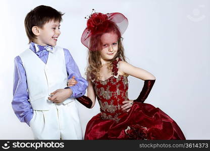 Portrait of a little boy and girl in beautiful dress