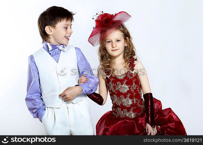 Portrait of a little boy and girl in beautiful dress