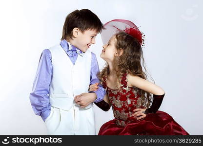 Portrait of a little boy and girl in beautiful dress