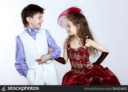 Portrait of a little boy and girl in beautiful dress