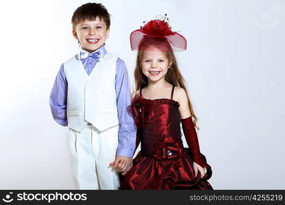 Portrait of a little boy and girl in beautiful dress