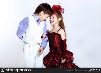 Portrait of a little boy and girl in beautiful dress