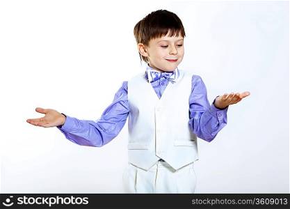Portrait of a little boy dressed for a celebration