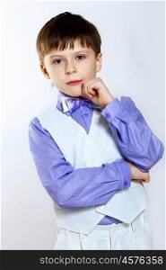 Portrait of a little boy dressed for a celebration