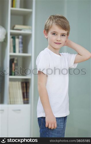 Portrait of a little boy in casuals at home