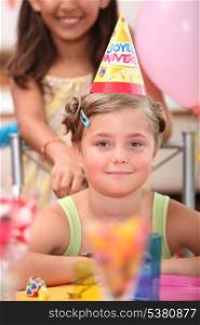 portrait of a little girl at birthday party