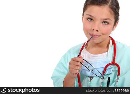portrait of a little girl dressed as a nurse