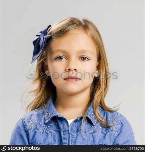 Portrait of a little girl making a serious expression