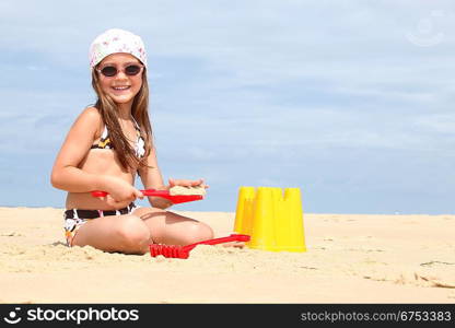 portrait of a little girl on the beach