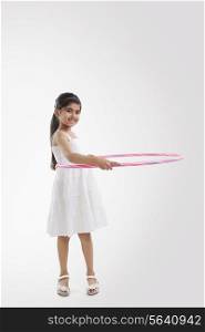 Portrait of a little girl with a hoola hoop