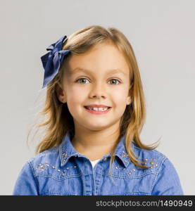 Portrait of a little girl with a smiling expression