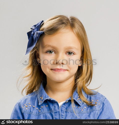 Portrait of a little girl with a smiling expression