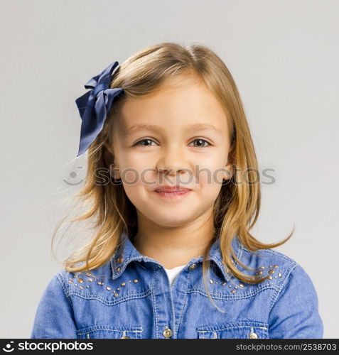 Portrait of a little girl with a smiling expression