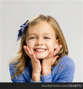 Portrait of a little girl with a smiling expression