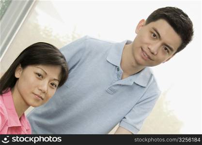 Portrait of a male and a female office worker