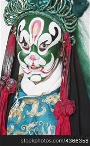 Portrait of a male Chinese opera performer grimacing
