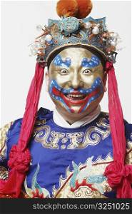 Portrait of a male Chinese opera performer laughing