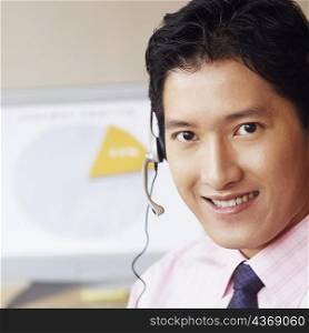 Portrait of a male customer service representative smiling